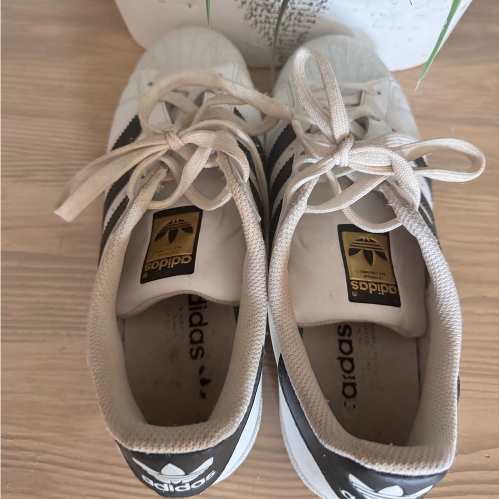 adidas White and Black Retro Leather Sneakers with Gold Logo